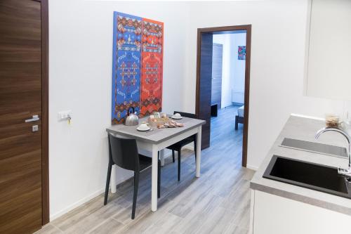 Кухня или мини-кухня в Apartments Porta di Castro
