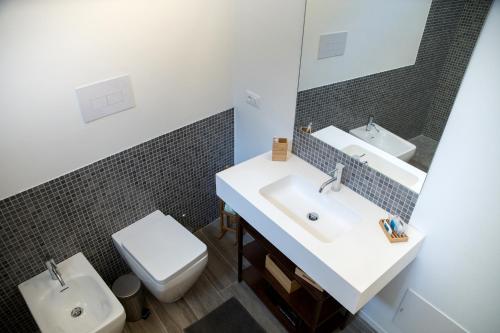 Ванная комната в Apartments Porta di Castro