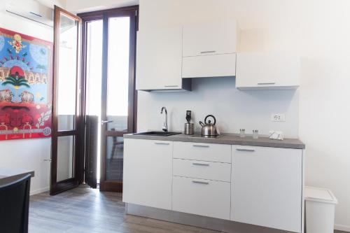 Кухня или мини-кухня в Apartments Porta di Castro
