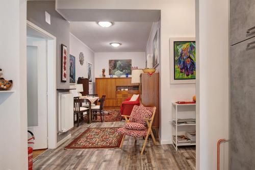 a hallway with a living room and a dining room at appartamento Monika con parcheggio in Volano
