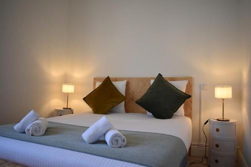 Postel nebo postele na pokoji v ubytování L'Opaline