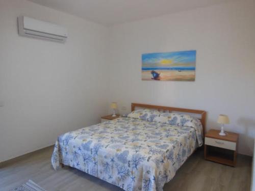 Postel nebo postele na pokoji v ubytování PUNTO ZERO ROOMS