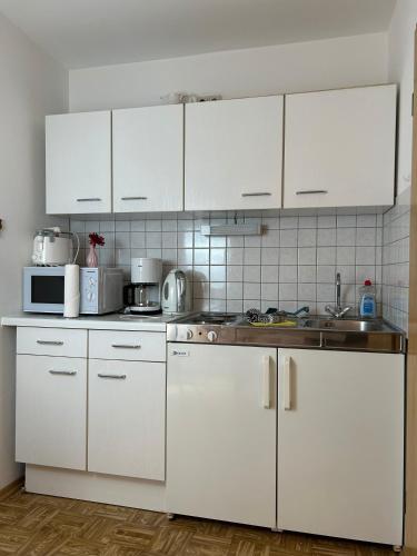 Kuchyň nebo kuchyňský kout v ubytování FeWo FIori