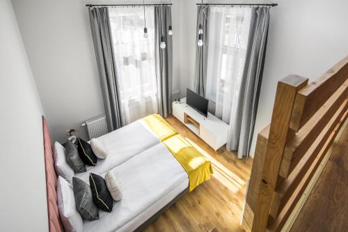 Ένα ή περισσότερα κρεβάτια σε δωμάτιο στο Horizon Park Aparthotel