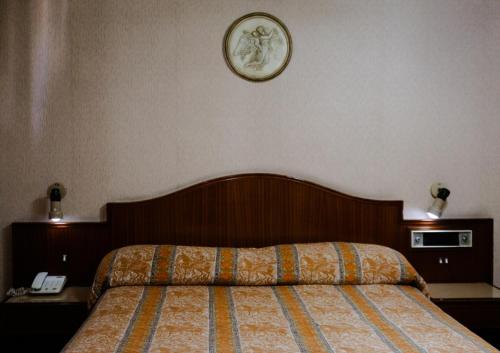 Ένα ή περισσότερα κρεβάτια σε δωμάτιο στο Eleven Palace Hotel