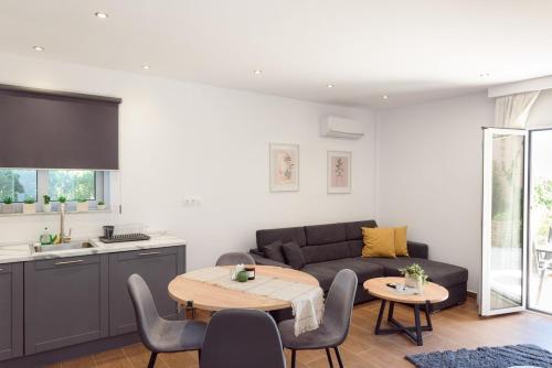 Posezení v ubytování ANGELINA'S FAMILY apartment