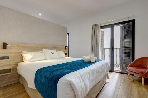 Posteľ alebo postele v izbe v ubytovaní Aqua Apartments Málaga
