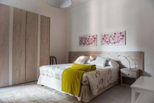 Voodi või voodid majutusasutuse Veraloano Apartments toas