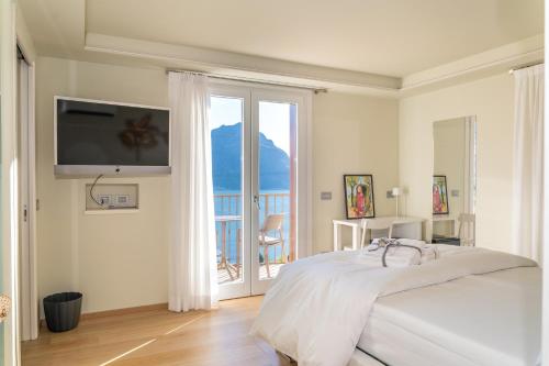 Ένα ή περισσότερα κρεβάτια σε δωμάτιο στο Rooms Le Rive 23