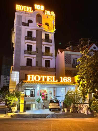 a hotel at night with a car parked in front at 168 Hotel in Ho Chi Minh City