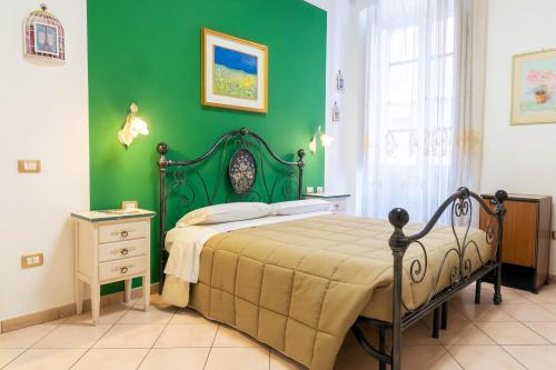 Postel nebo postele na pokoji v ubytování Le Tre Stelle