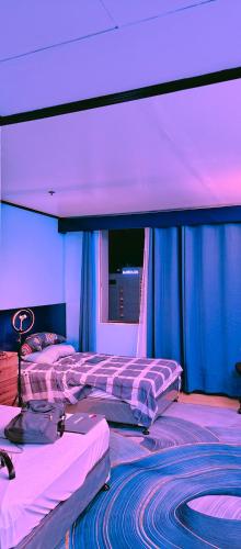 Χώρος καθιστικού στο 2 Double Beds Available Golden Peak Condotel