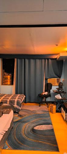 Χώρος καθιστικού στο 2 Double Beds Available Golden Peak Condotel