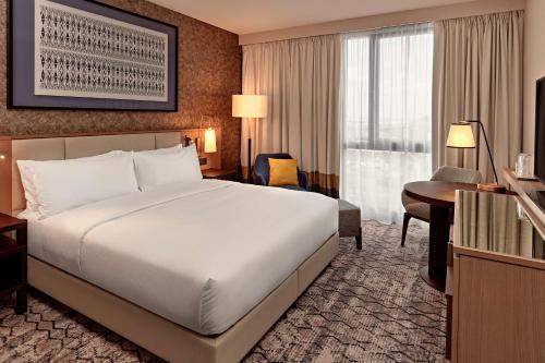 Un ou plusieurs lits dans un hébergement de l'établissement Hilton Vienna Park