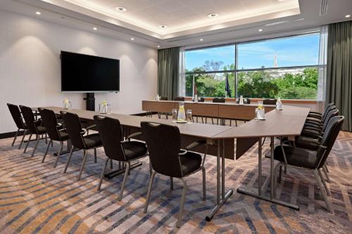 Télévision ou salle de divertissement dans l'établissement Hilton Vienna Park