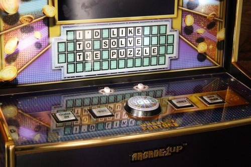 a close up of a game in a machine at The Cove Guest House in Prescott