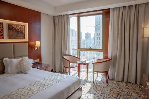 Postel nebo postele na pokoji v ubytování فندق الاء البيت Alaa Al Bayt Hotel
