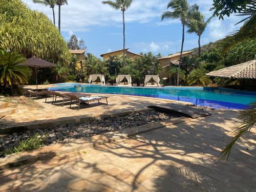 Piscina en o cerca de Girassóis Suítes
