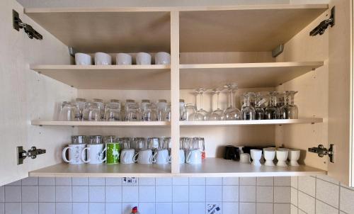 Kuchyň nebo kuchyňský kout v ubytování Sonnenschein 0L mit Terrasse und Garten