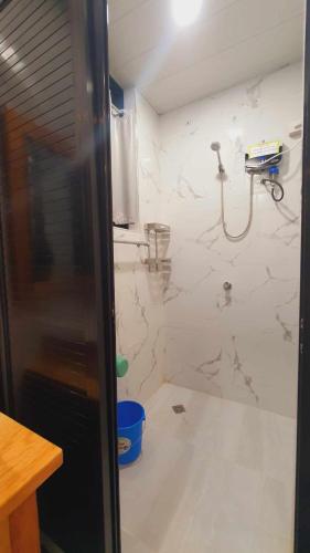 a bathroom being remodeled with a shower in it at Tuking Mt Inn and Restaurant in Sagada