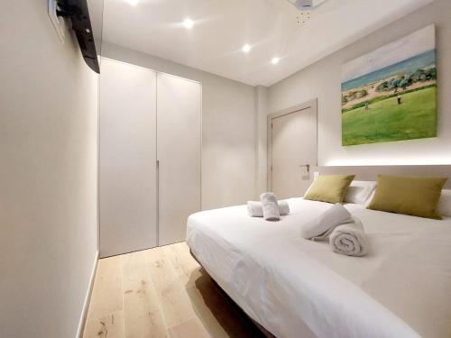 Postel nebo postele na pokoji v ubytování Fitness & Spa, Suite Atalanta Valencia