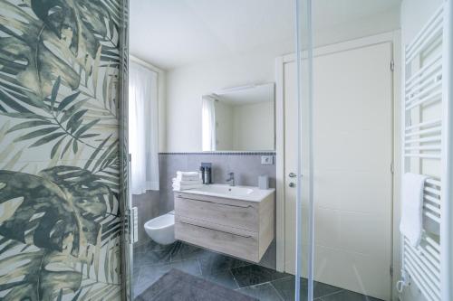 Ένα μπάνιο στο Rooms Le Rive 23