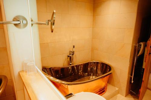 a bathroom with a sink and a toilet at The Fleece at Ruleholme in Carlisle