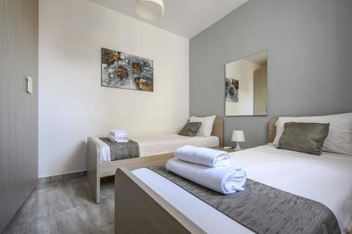 Postel nebo postele na pokoji v ubytování F11 Room 2, Private Room two single beds shared bathroom in shared Flat