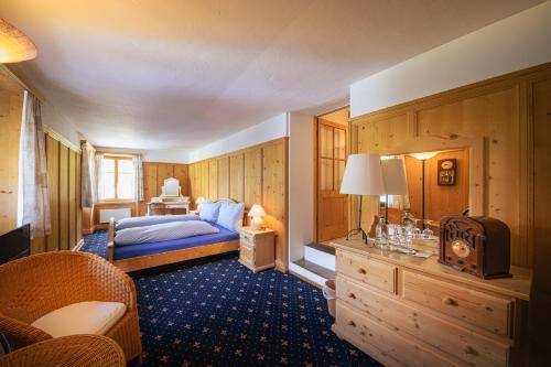 Postel nebo postele na pokoji v ubytování Albergo Ristorante Grotto Miralago
