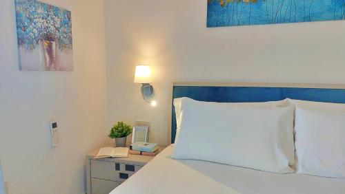 Letto o letti in una camera di Sant Joan Luxury Stay