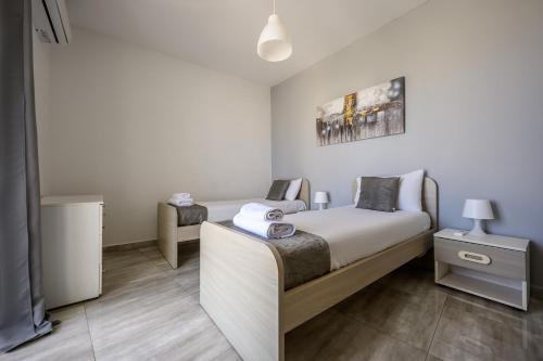 Postel nebo postele na pokoji v ubytování F11 Room 3, private Room two single beds shared bathroom in shared Flat