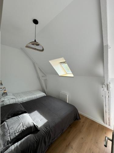 Katil atau katil-katil dalam bilik di Gîte du Marais