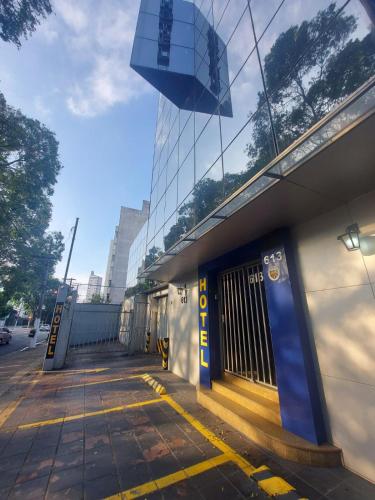 a building with a door on the side of it at Hotel Mooca in Sao Paulo