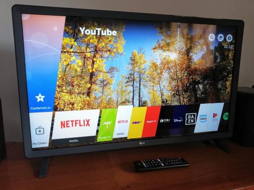 Televisyen dan/atau pusat hiburan di Relax tra i monti di Pescasseroli