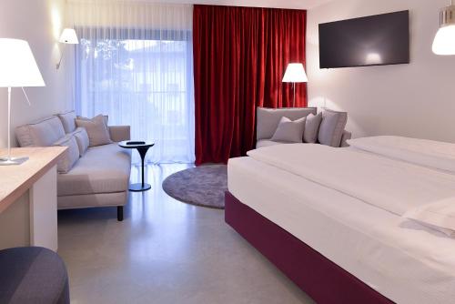 Letto o letti in una camera di Villa Miravalle