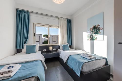 Ein Bett oder Betten in einem Zimmer der Unterkunft Apart Hotel Perla Resort Lalez Durres