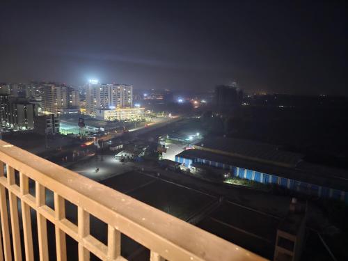 a view of a city at night at Ultra Luxury 1Bhk 1121 Flat By Bliss Stay in Ghaggar