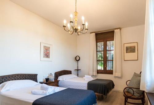 En eller flere senge i et værelse på El Mirador Esencia Mediterránea