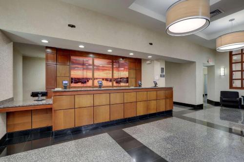 a lobby with a reception desk in a hospital at Drury Inn & Suites Charlotte Northlake in Charlotte