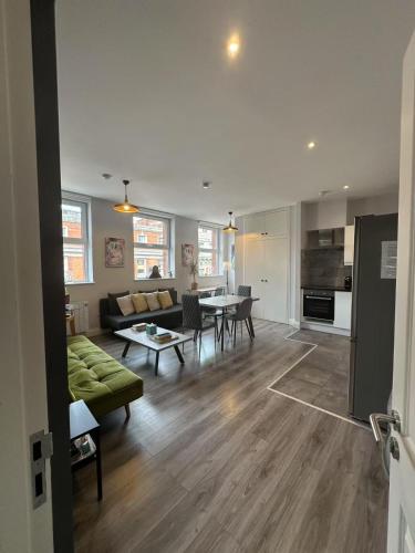a living room with a couch and a table at Abbey Apartments in Dublin