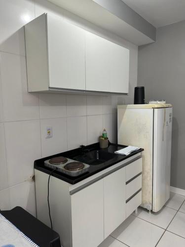 Kuchyň nebo kuchyňský kout v ubytování Apartamento Studio amplo, Completo com Internet