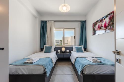 Ein Bett oder Betten in einem Zimmer der Unterkunft Apart Hotel Perla Resort Lalez Durres