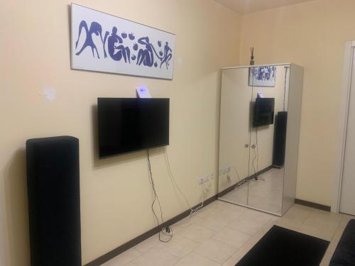 a room with two speakers and a tv on a wall at La Terrazza in San Giovanni Valdarno
