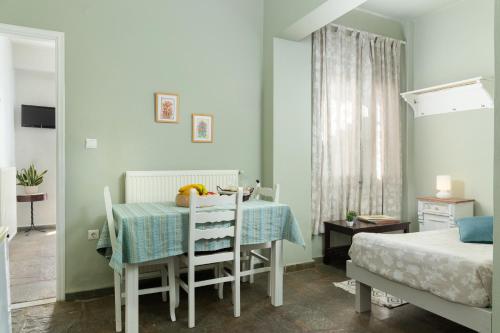 Postel nebo postele na pokoji v ubytování Villa Arni Andros - Βίλα ΑΡΝΗ