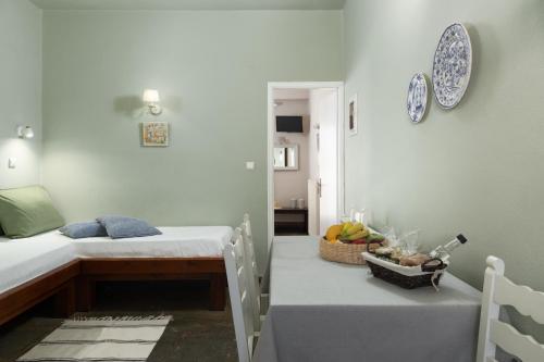 Postel nebo postele na pokoji v ubytování Villa Arni Andros - Βίλα ΑΡΝΗ