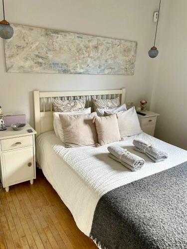 Ένα ή περισσότερα κρεβάτια σε δωμάτιο στο Apartamento en Comillas-Garden Apartment in Comillas