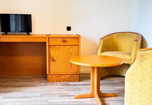 TV a/nebo společenská místnost v ubytování Cozy Ground Floor Retreat in Marx