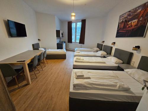 Ένα ή περισσότερα κρεβάτια σε δωμάτιο στο ApartHotel Slumber 24h Self Check in