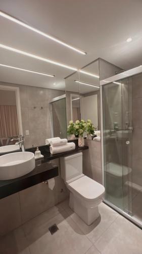 a bathroom with a toilet and a sink and a shower at Hotel São Paulo - Premium Experience - Ibirapuera - Moema District in Sao Paulo