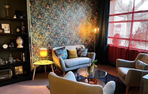 Cit'Hotel Le Louvre Orangeにあるシーティングエリア